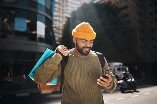 happy man after getting his purchase thanks to merchandise financial planning process efficiency