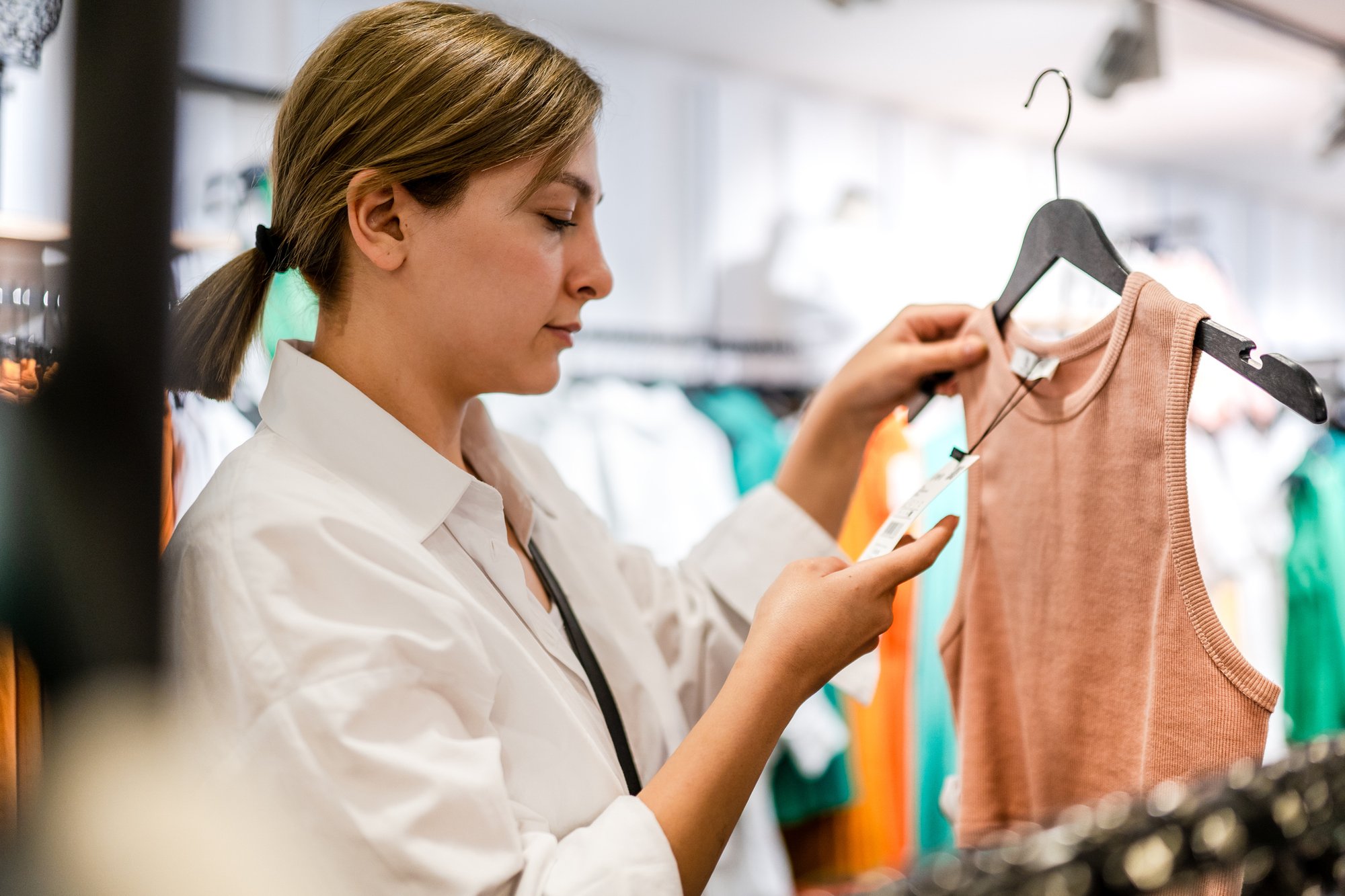 Woman checking price tag
