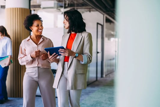 Retail leaders collaborating on AI-driven inventory management and visual merchandising strategies.