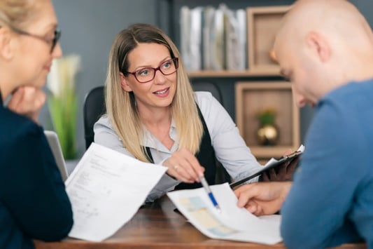 Retail professional comparing pricing data using AI orchestration and real-time data analysis tools