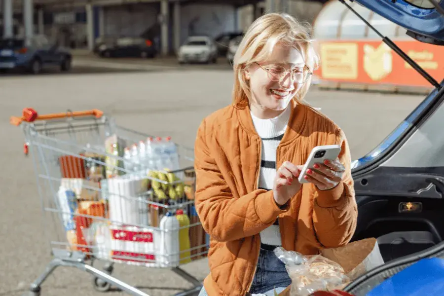 woman considering omnichannel grocery shopping options