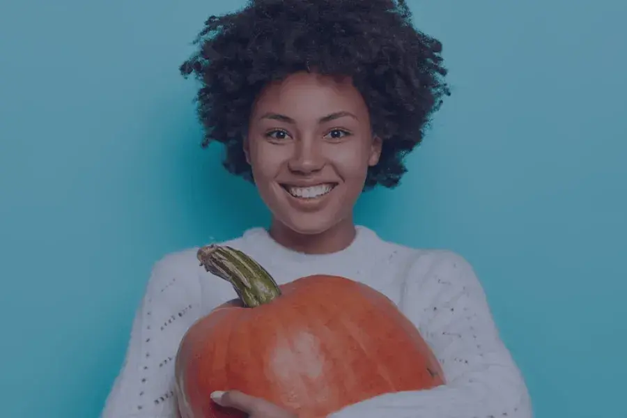 woman happy about the halloween retail seasonal inventory