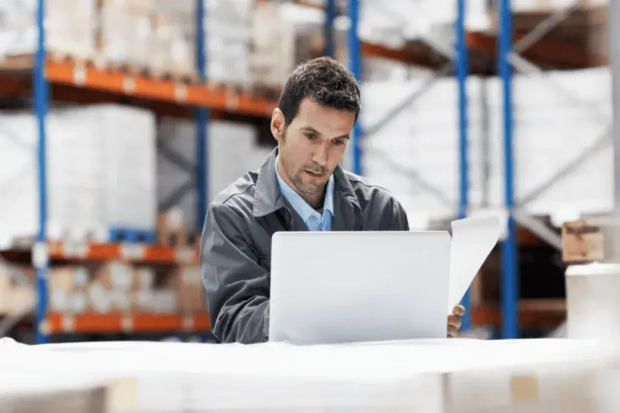 man determining lost sales in inventory