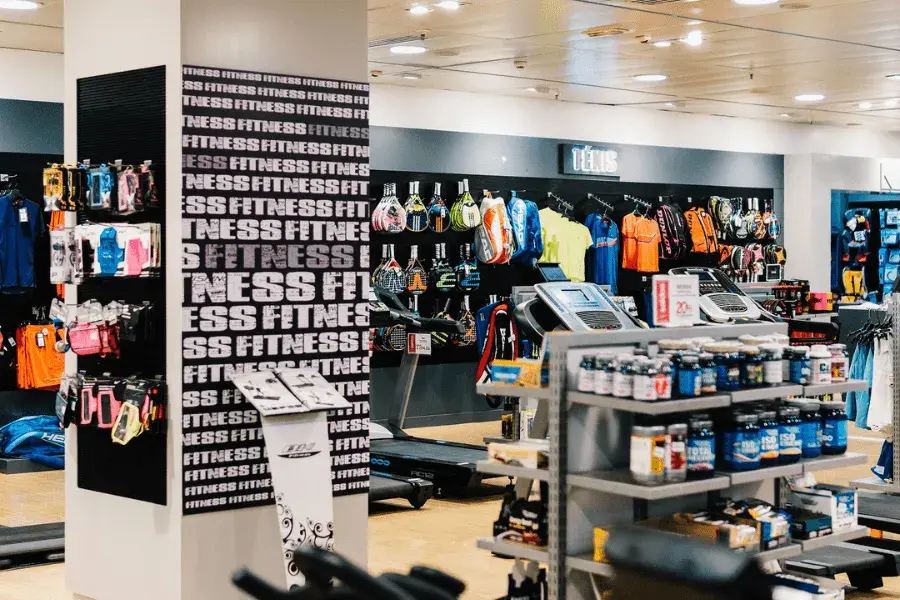 A sports retail store highlighting the role of retail inventory management systems in balancing stock for hard and soft goods