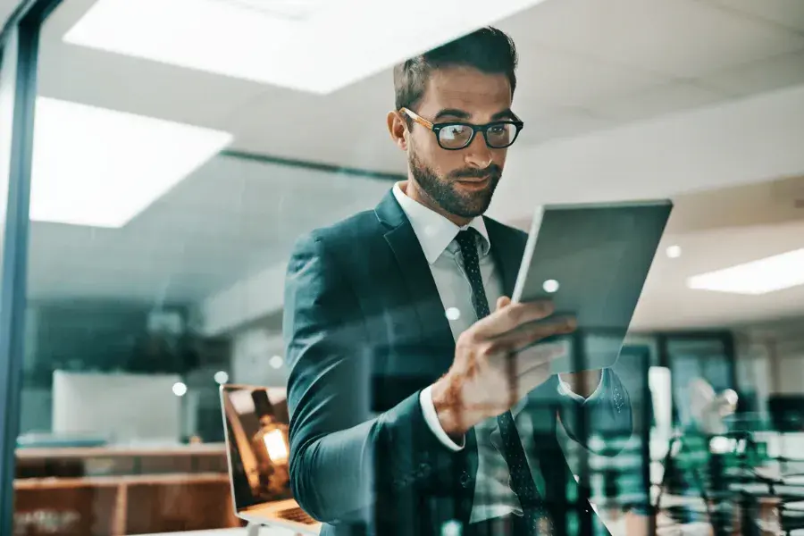 Retail executive exploring retail technology tools for POS systems, digital transformation, and inventory management.