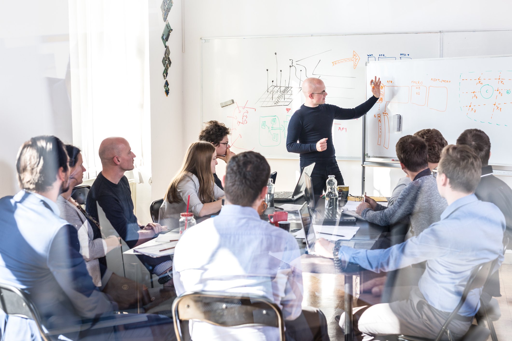 Business leader reviews AI dashboards, evaluating agentic AI vendor for enterprise integration and workflow automation