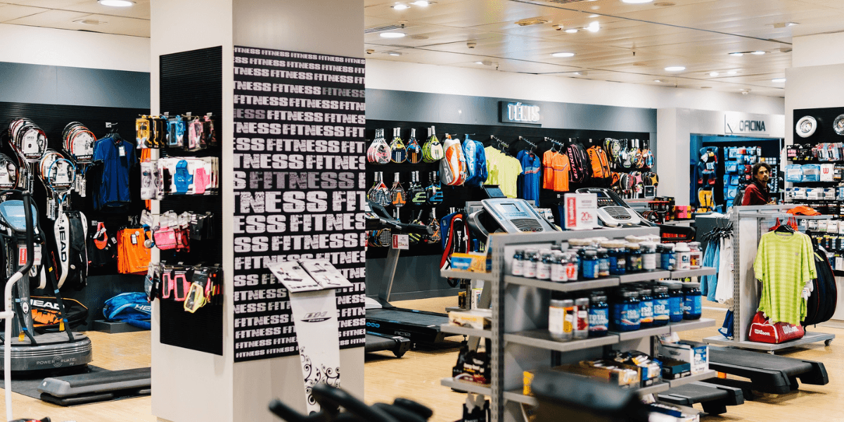 A sports retail store highlighting the role of retail inventory management systems in balancing stock for hard and soft goods