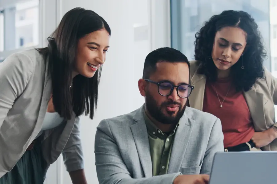 Retail team collaborating on inventory planning using data and AI-driven workflows to improve inventory optimization and reduce manual work.