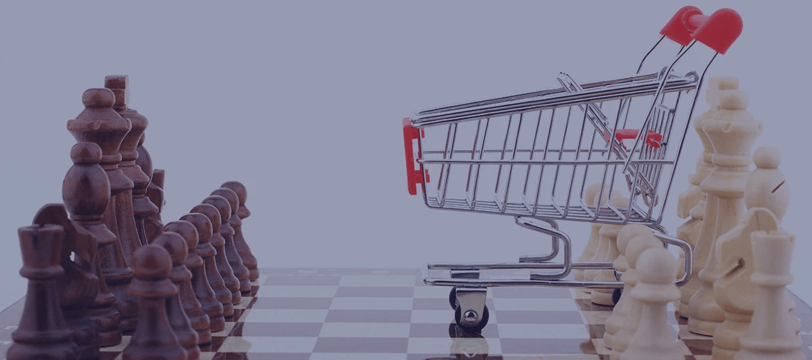 A chessboard with a miniature shopping cart in the middle, symbolizing an omnichannel retail strategy that seamlessly integrates mobile apps, physical stores, and online shopping to enhance customer journey and satisfaction across all channels.